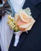 CLASSIC rose buttonholes. Image by John Montesi Photography