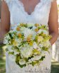 GARDEN Bridal Bouquet "Madelyn" consisting of dahlias, hydrangea, lisianthus, roses, freesias, bouvardia, billy buttons and ivy berry. Image by Carly Hack Photography.