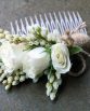 Floral Hair Comb consisting of spray roses and andromeda.  Image by The White Orchid Floral Design.