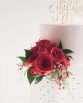 INDUSTRIAL Cake Flowers consisting of roses and pepper berry.  Image by Evan Bailey Photography.