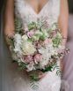 GARDEN Bridal Bouquet "Emily" consisting of roses, stocks, sweet peas and pepper berry. Image by Luke Simon Photography.