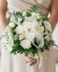 INDUSTRIAL Bridesmaid Bouquet "Ashlea" consisting of white hydrangea, freesia, scabiosa, pom pom chrysanthemums, snow berry, veronica, blue gum foliage and fern. Image by Jade Norwood.