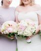 CLASSIC Bridesmaid Bouquets "Ann" consisting of peonies, roses, freesia, hydrangea, lisianthus, ranunculi and hebe leaf. Image by Nicole Cordeiro Photography.
