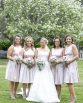 CLASSIC Bridesmaids Bouquets "Hayley" consisting of ranunculi, roses, gypsophila and dusty miller. Image by Alice Healy Photography.