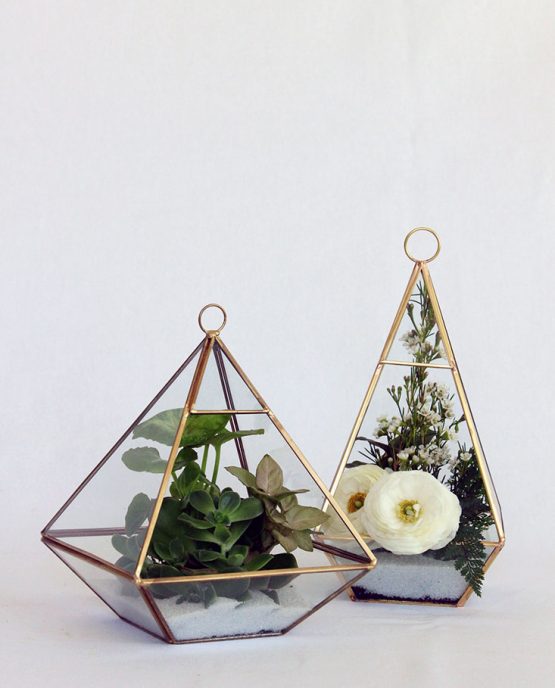 INDUSTRIAL Terrariums filled with petite plants, succulents or flowers.  Image by The White Orchid Floral Design.